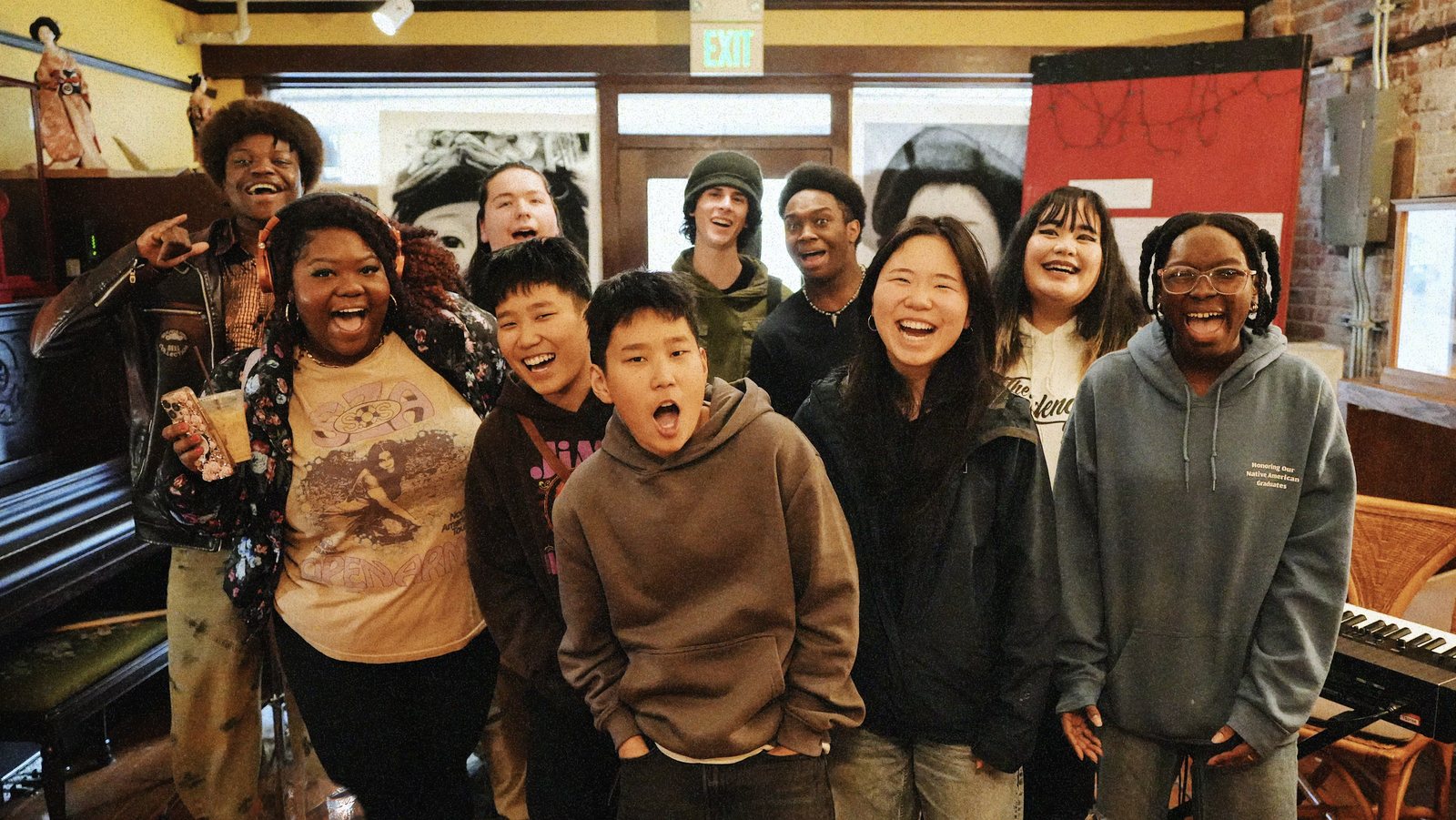 Young musicians and mentors together at a Totem Star showcase — a creative youth development community