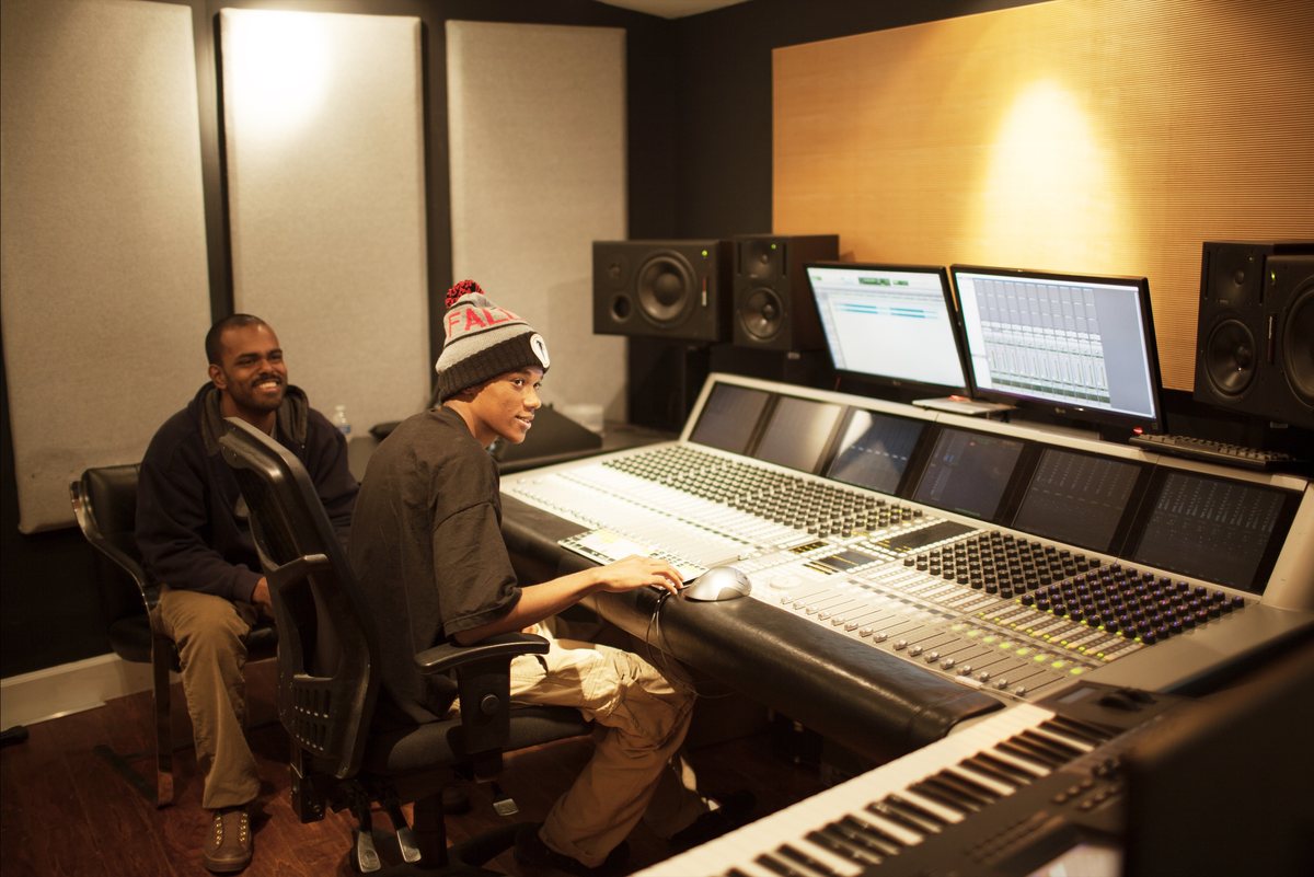 David's Harp Foundation founder Brandon Steppe mentoring a young person in the recording studio — creative youth development in practice